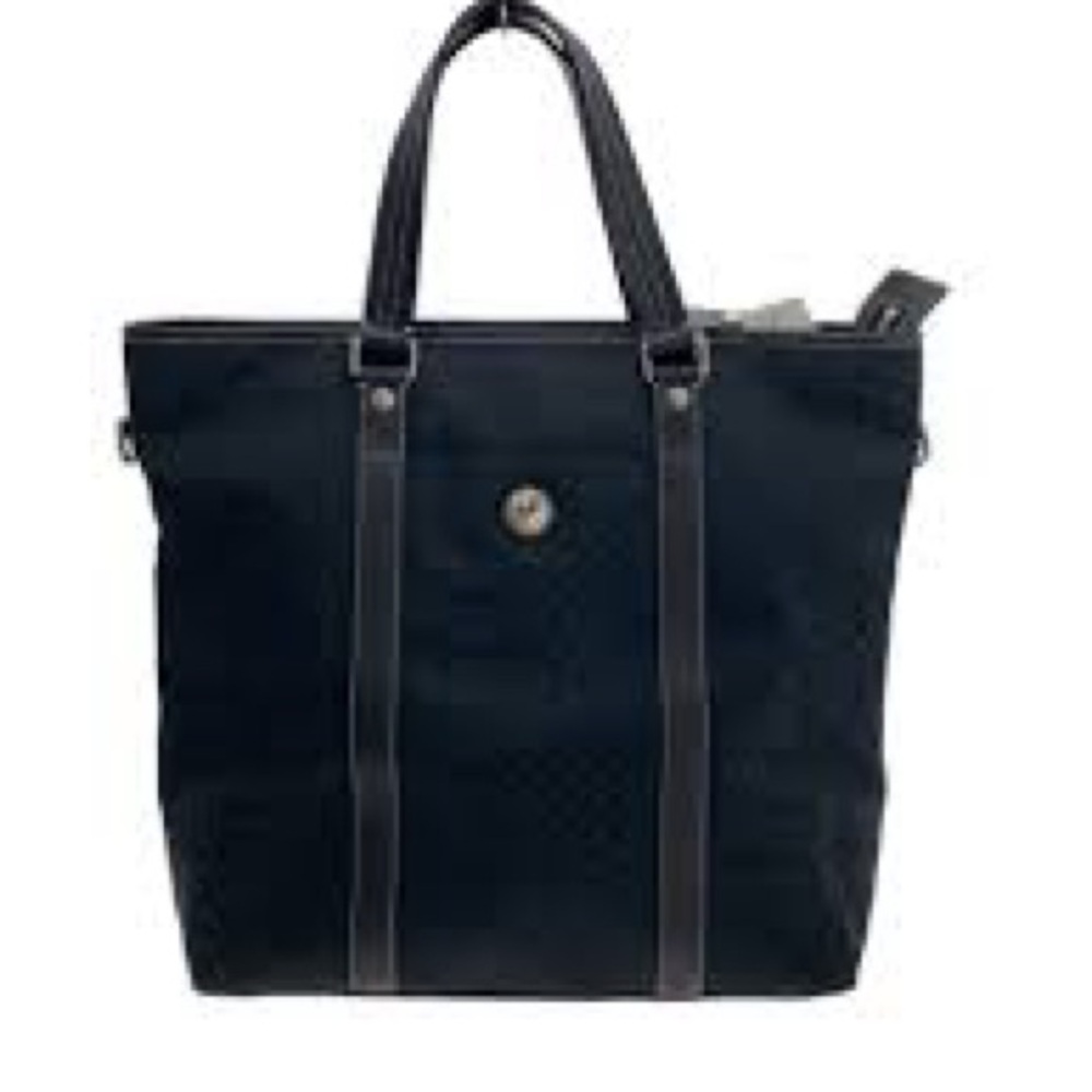 Coach travel Signature tote black featuring monogram canvas and leather 2009